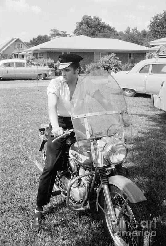 Elvis Presley Poster featuring the photograph Elvis Presley with his 1956 Harley KH and his Cadillacs by The Harrington Collection