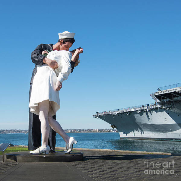 Embracing Peace Sculpture Art Print featuring the photograph Embracing Peace Sculpture and USS Midway Aircraft Carrier by David Levin
