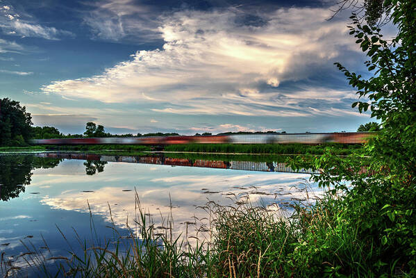 Train Blurred Lake Clouds Reflection Blue Green Horizontal Evansville Wi Wisconsin Lake Leota Leota Park Art Print featuring the photograph Frozen Reflections by Peter Herman