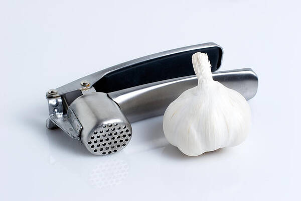 Garlic Art Print featuring the photograph Garlic Press With Garlic by Tom Mc Nemar