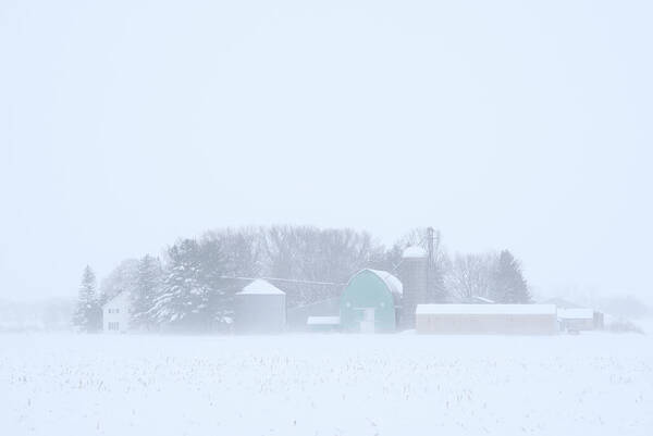 Pastel Art Print featuring the photograph Cool Pastels - pastel colored farm buildings in a Wisconsin snowstorm by Peter Herman