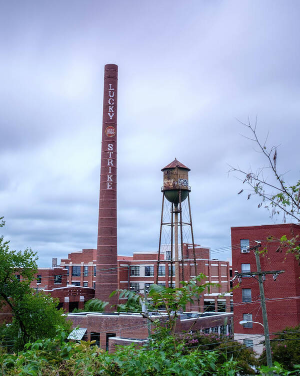 Cloudy Day Art Print featuring the photograph Lucky Strike Smokestack by Doug Ash