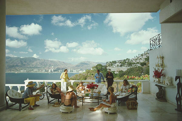 People Art Print featuring the photograph Guests At Villa Nirvana by Slim Aarons