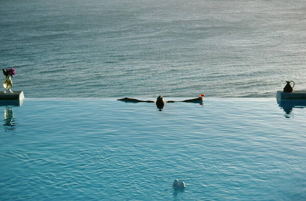 1980-1989 Art Print featuring the photograph Mustique Pool by Slim Aarons