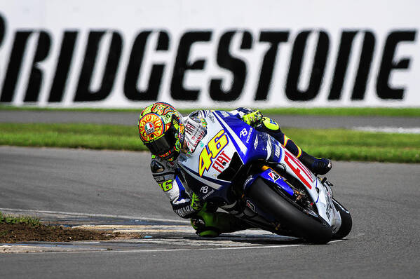 Valentino Rossi Art Print featuring the photograph Valentino Rossi Donington Park 2009 by Tony Goldsmith