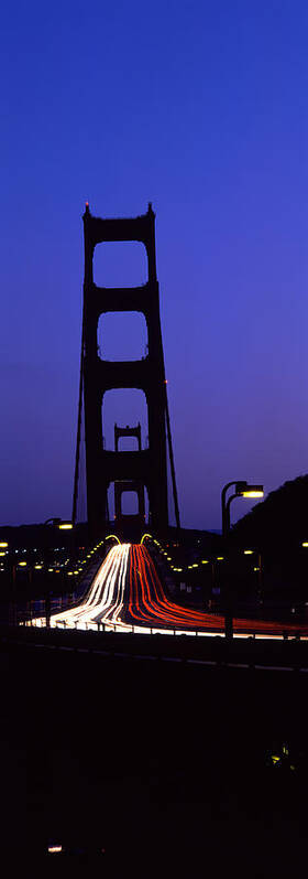Photography Art Print featuring the photograph Traffic On A Suspension Bridge, Golden #1 by Panoramic Images