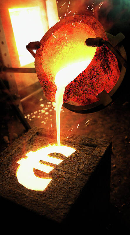 Bright Art Print featuring the photograph Molten Metal Pouring Into Euro Sign Mold by Ikon Ikon Images