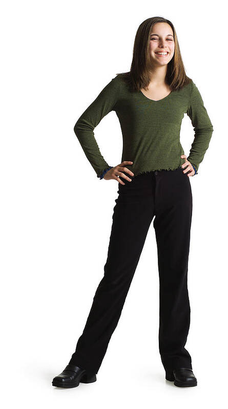 White Background Art Print featuring the photograph Silhouette Of A Caucasian Teenage Girl In Black Pants And A Green Shirt As She Smiles At The Camera by Photodisc