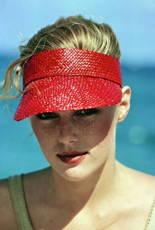 #condenastvoguephotograph Art Print featuring the photograph Patti Hansen Wearing A Red Visor #5 by Arthur Elgort