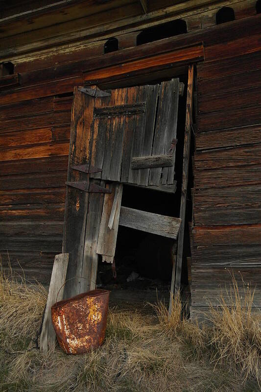 Old Art Print featuring the photograph A Bucket And A Door by Jeff Swan