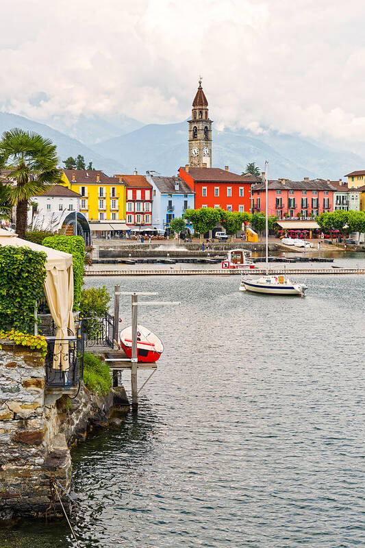 Scenics Art Print featuring the photograph Ascona, old town houses with clock tower by Syolacan