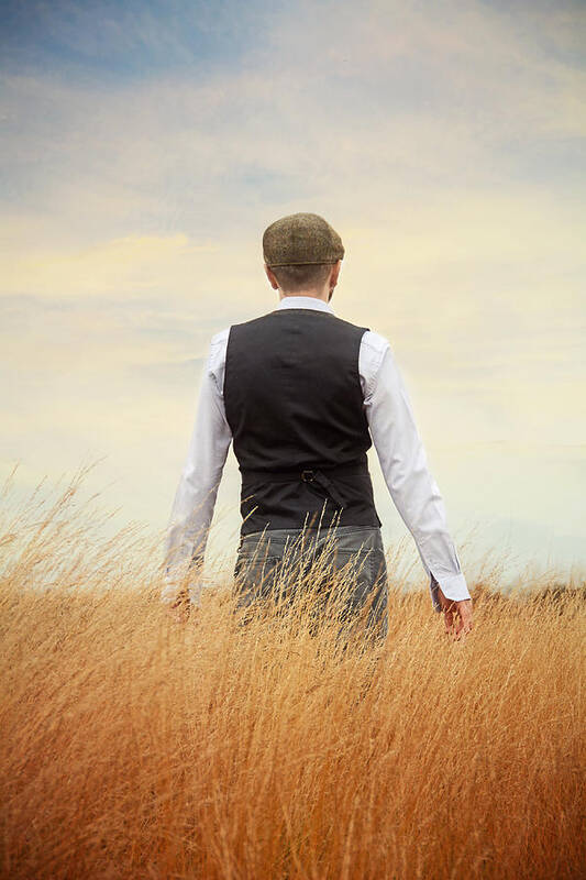 Mature Adult Art Print featuring the photograph Back of Man Standing in Tall Grass by Vesna Armstrong