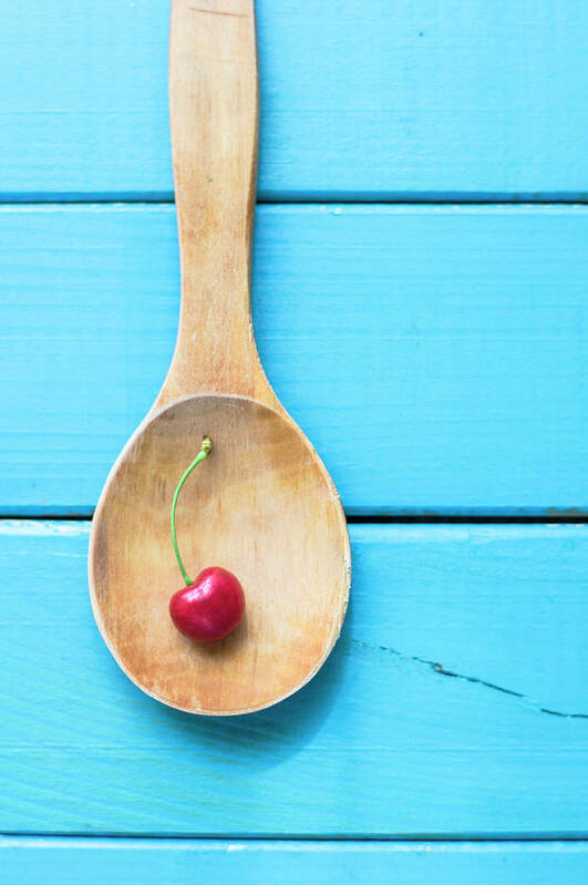 Cherry Art Print featuring the photograph Cherry In A Wooden Spoon by C.aranega