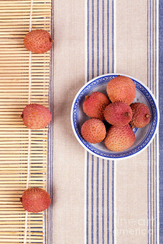 Fruit Art Print featuring the photograph Lychess with bamboo mat by Jane Rix