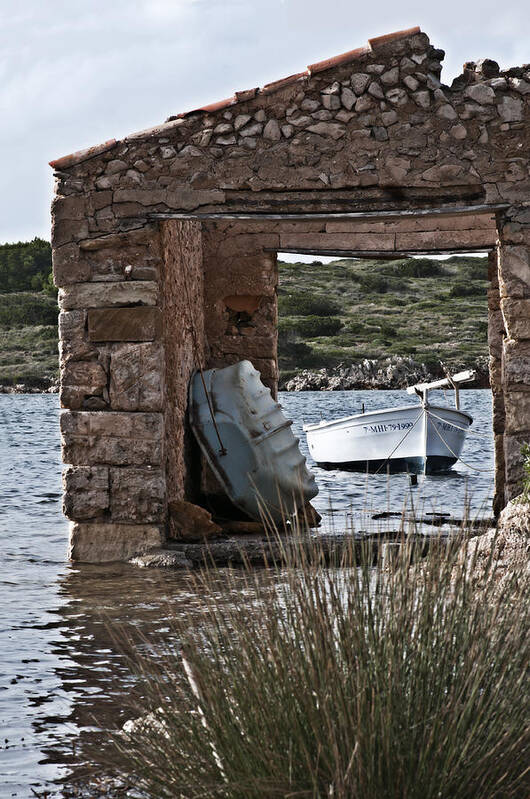 Beauty Art Print featuring the photograph Vintage boat framed in nature of Minorca island - Hide and seek by Pedro Cardona Llambias