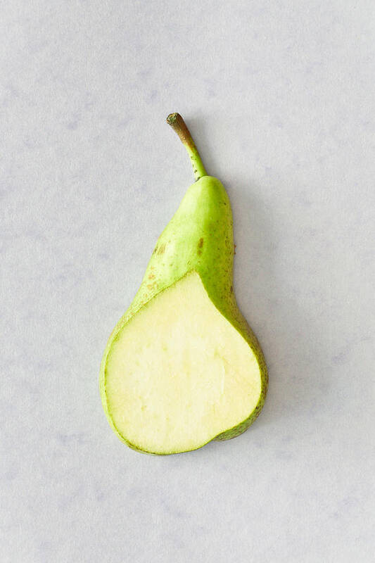 Background Art Print featuring the photograph Pear by Tom Gowanlock