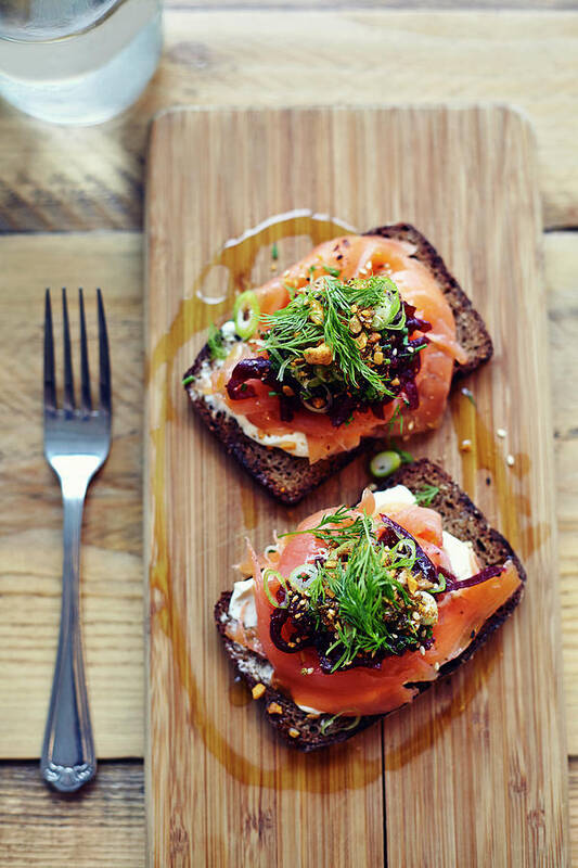 Bakery Art Print featuring the photograph Salmon Tartine On Rye Bread On Wooden by Jake Curtis