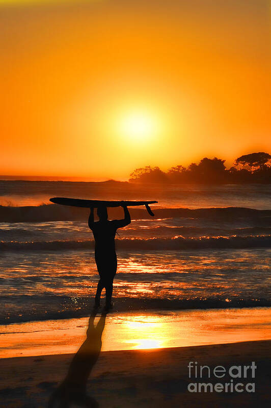 Surfer Art Print featuring the photograph Surfer at sunset Ventura Beach by Dan Friend