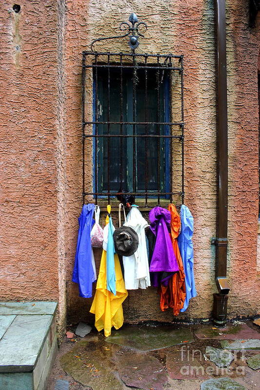 Raincoat Art Print featuring the photograph Window Raincoat Rack by Andre Turner