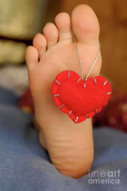 People Art Print featuring the photograph Valentine heart hanging on girl's barefeet #1 by Sami Sarkis
