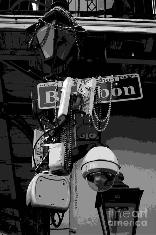 New Orleans Art Print featuring the digital art Bourbon Street Sign and Lamp Covered in Beads Clack and White Cutout Digital Art by Shawn O'Brien