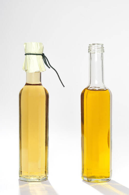 Balsamic Vinegar Art Print featuring the photograph Oil and vinegar bottles by Matthias Hauser