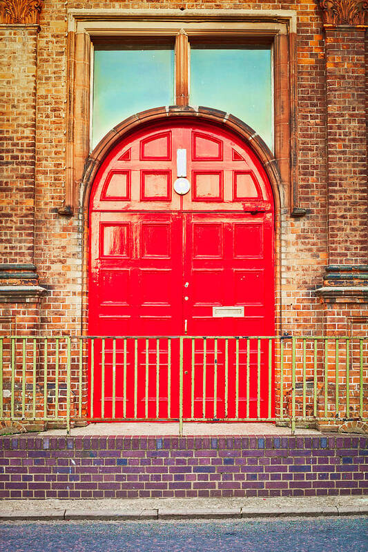 Arch Art Print featuring the photograph Red door by Tom Gowanlock