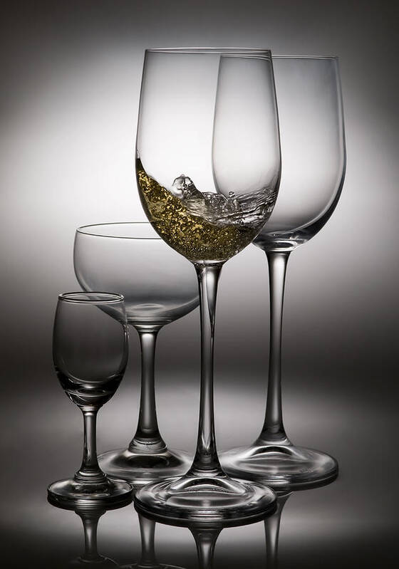 Abstract Art Print featuring the photograph Splashing Wine In Wine Glasses by Setsiri Silapasuwanchai