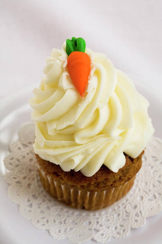 Carrot Muffin Art Print featuring the photograph A carrot muffin by Diane Macdonald