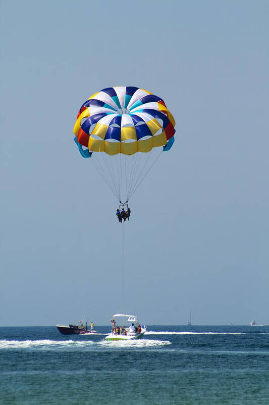 Parasailing Art Print featuring the photograph Colorful Parasailing by Kathy Clark