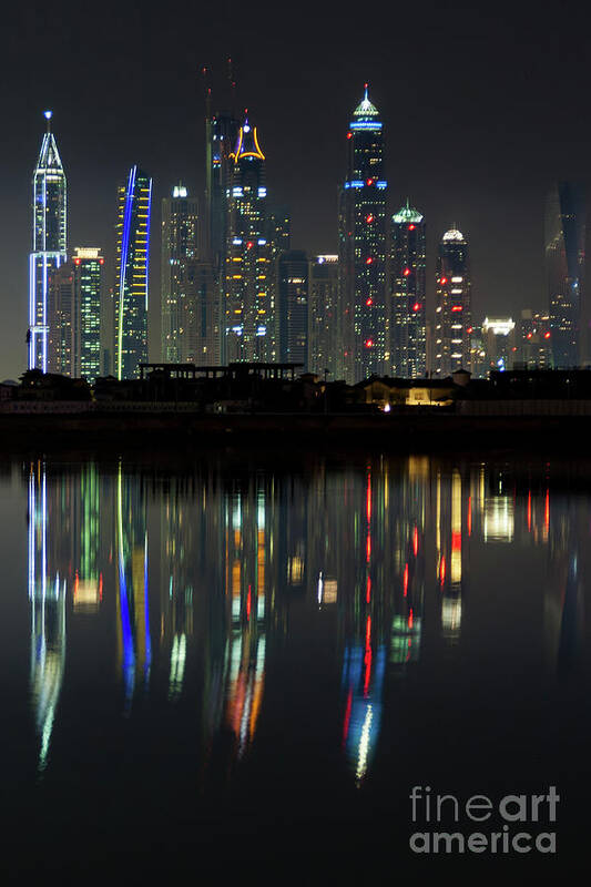 Dubai Art Print featuring the photograph Dubai city skyline nighttime by Andy Myatt