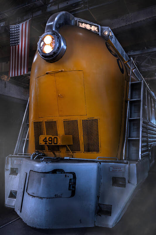 315 490 Locomotive Commercial Industrial Age Train Railroad Rail Engine Power Powerful Majestic Color Vertical Tall American Flag America Us Usa B&o Baltimore Yellow Orange Blue Gray Chrome Red White Blue Smooth Streamline Steam Headlight Md Maryland Indoors Shop Steel Dark Steve Steven Maxx Photography Photo Photographs Art Print featuring the photograph Locomotive by Steven Maxx