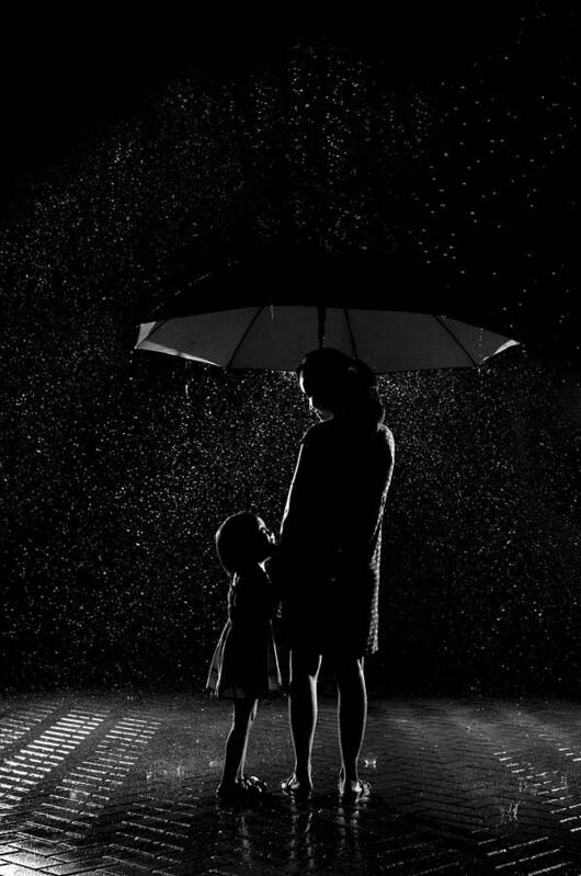 Umbrella Art Print featuring the photograph Love In The Rain by Alfonso Reno