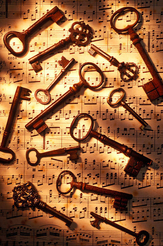 Key Art Print featuring the photograph Old skeleton keys on sheet music by Garry Gay