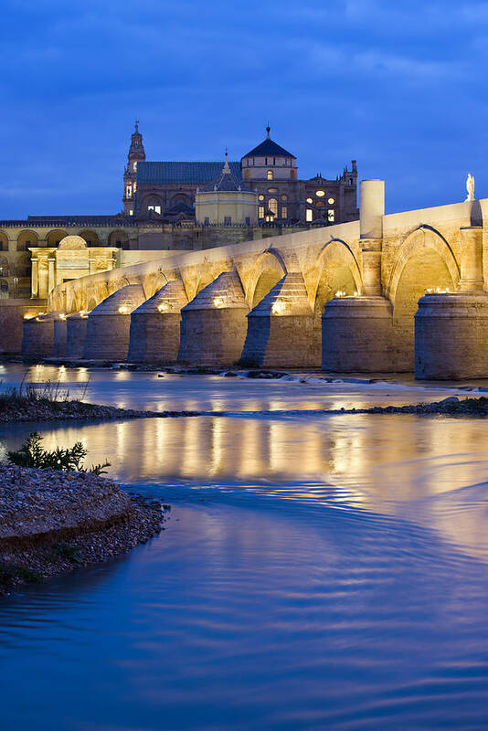 Roman Art Print featuring the photograph Roman Bridge on Guadalquivir River at Dawn by Artur Bogacki