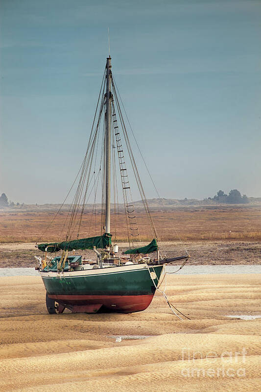 Wells Art Print featuring the photograph Norfolk sail boat stranded at low tide by Simon Bratt