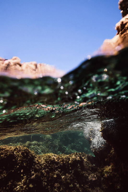 Underwater Art Print featuring the photograph Under Rocks by Gemma Silvestre