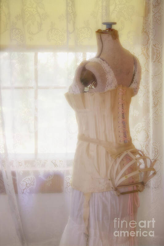 Antique; Vintage; Dress Form; Clothes; Old; Clothing; Mannequin; Old Fashioned; Seamstress; Sewing; Tailor; Cream; Female; Tie; Torso; Light; Bright; Window; Lace; Shade; Blinds; Underwear; Garments; Corset; Slip; Inside; Indoors; Interior; Bedroom Art Print featuring the photograph Undergarments by Margie Hurwich