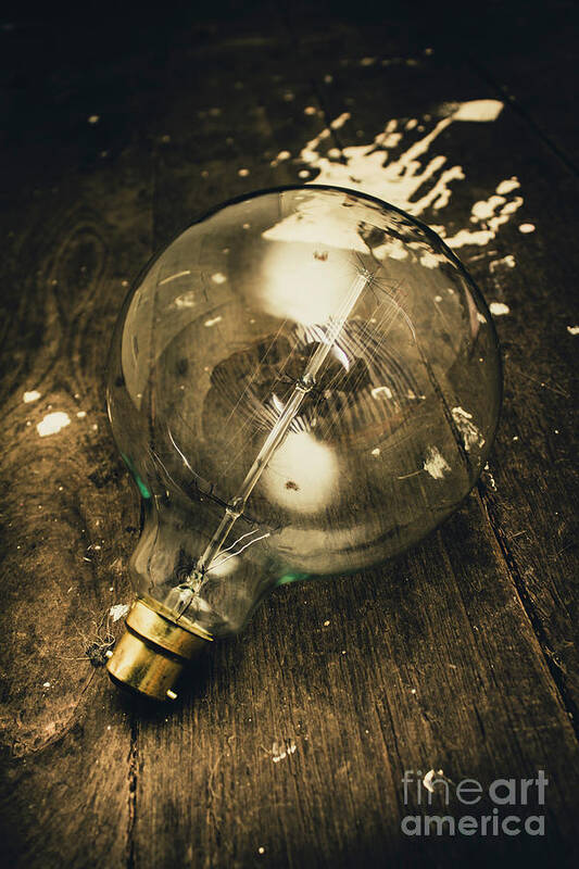 Bulb Art Print featuring the photograph Vintage light bulb on wooden table by Jorgo Photography