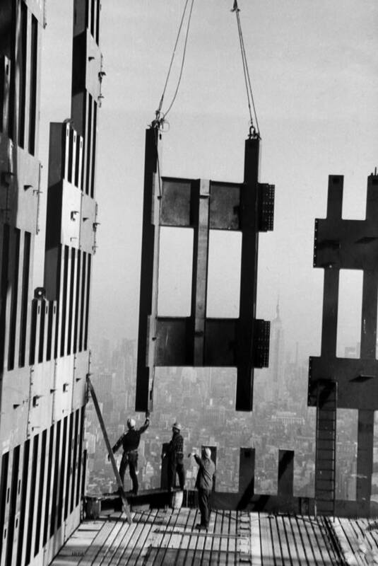 Twin Towers Art Print featuring the photograph Construction Workers On The Top Floors by New York Daily News Archive