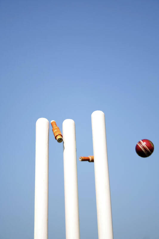 Clear Sky Art Print featuring the photograph Stumps Disturbed By A Cricket Ball #1 by Visage