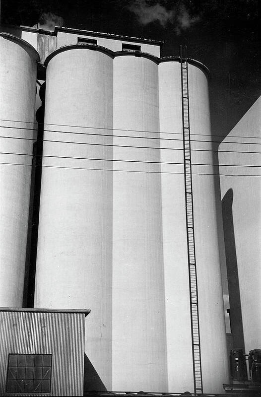 Elevator Art Print featuring the photograph A Grain Elevator by Peter Stackpole