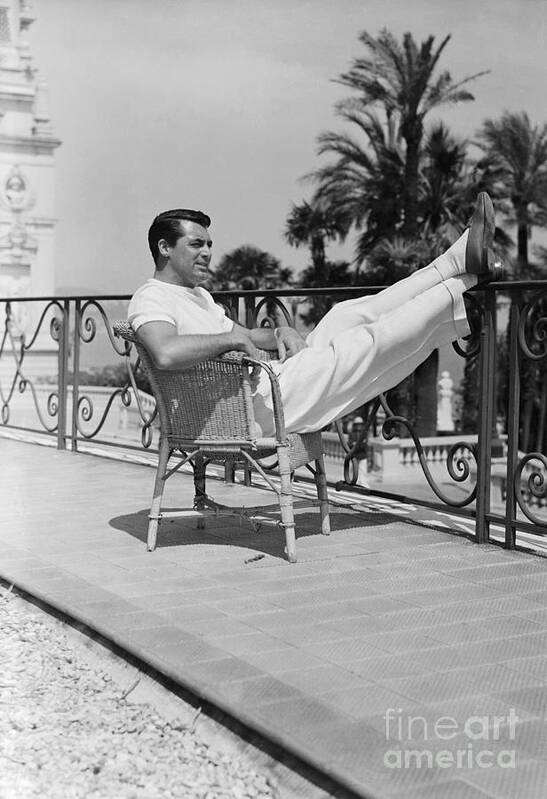 Cary Grant Art Print featuring the photograph Cary Grant Relaxing In Monte-carlo by Bettmann