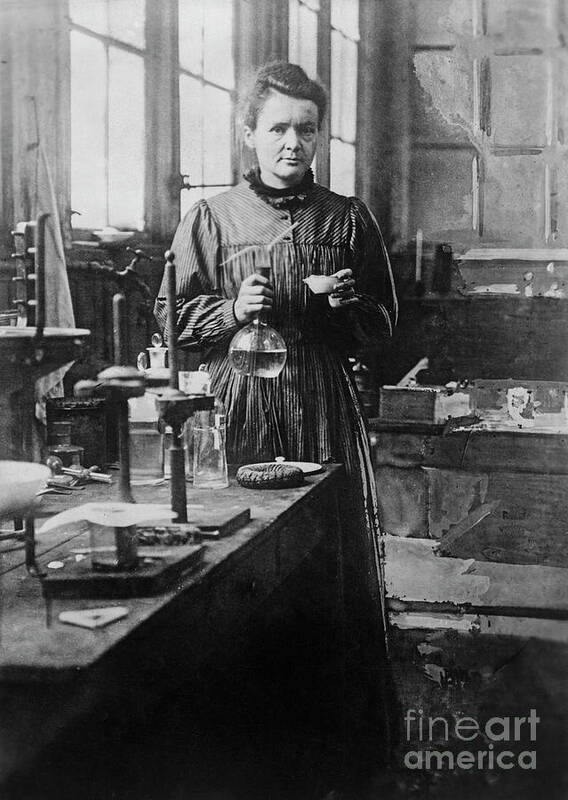 Marie Curie - Physicist Art Print featuring the photograph Chemist Marie Curie In Her Laboratory by Bettmann