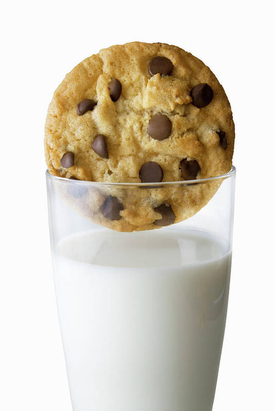 Milk Art Print featuring the photograph Chocolate Chip Cookie And Glass Of Milk by Burazin
