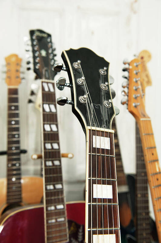 Recreational Pursuit Art Print featuring the photograph Close Up Of Various Guitars by Johner Images