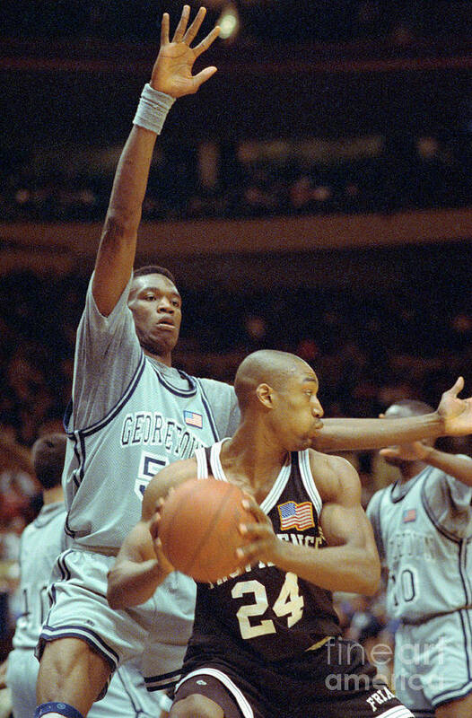 People Art Print featuring the photograph Dikembe Mutombo Blocking Marques Bragg by Bettmann