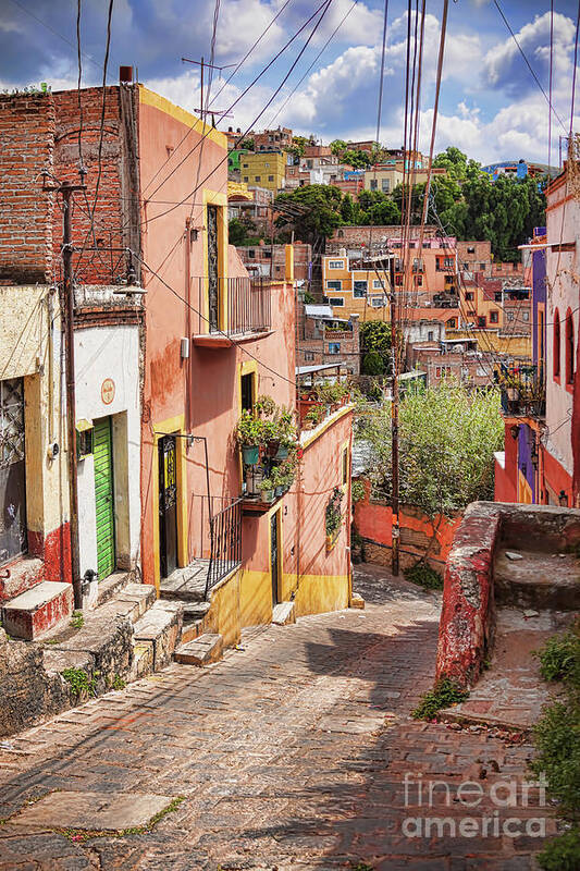 Downhill Art Print featuring the photograph Downhill narrow street in Guanajuato, Mexico by Tatiana Travelways