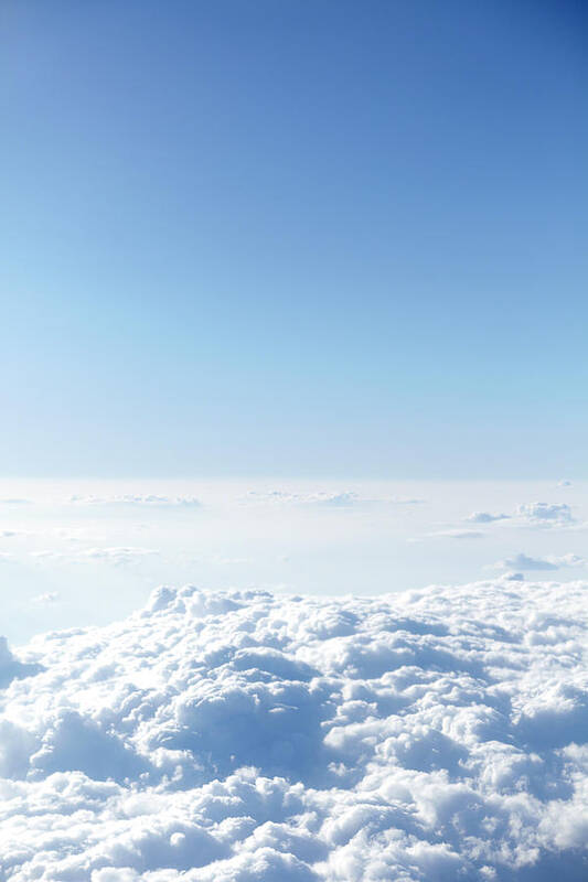 Tranquility Art Print featuring the photograph Fluffy Clouds, View From Airplane by Lewis Mulatero