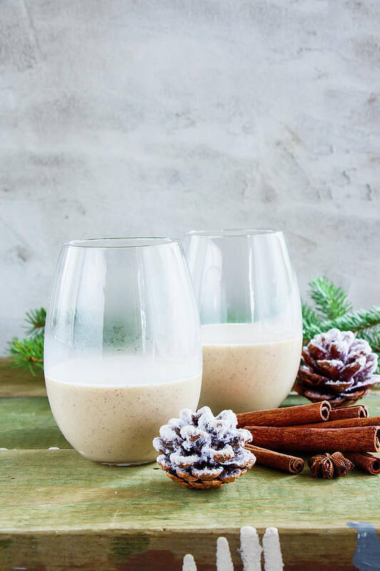 Glasses Of Traditional Winter Eggnog With Milk, Rum And Cinnamon, Christmas  Decorations On Wooden Table Metal Print by Yuliya Gontar - Pixels